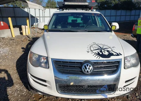 2009 Volkswagen Touareg 2 V6 Tdi z USA, uszkodzony, nr VIN WVGFM77L69D035120